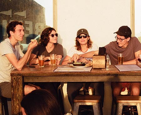 She sat at the back...